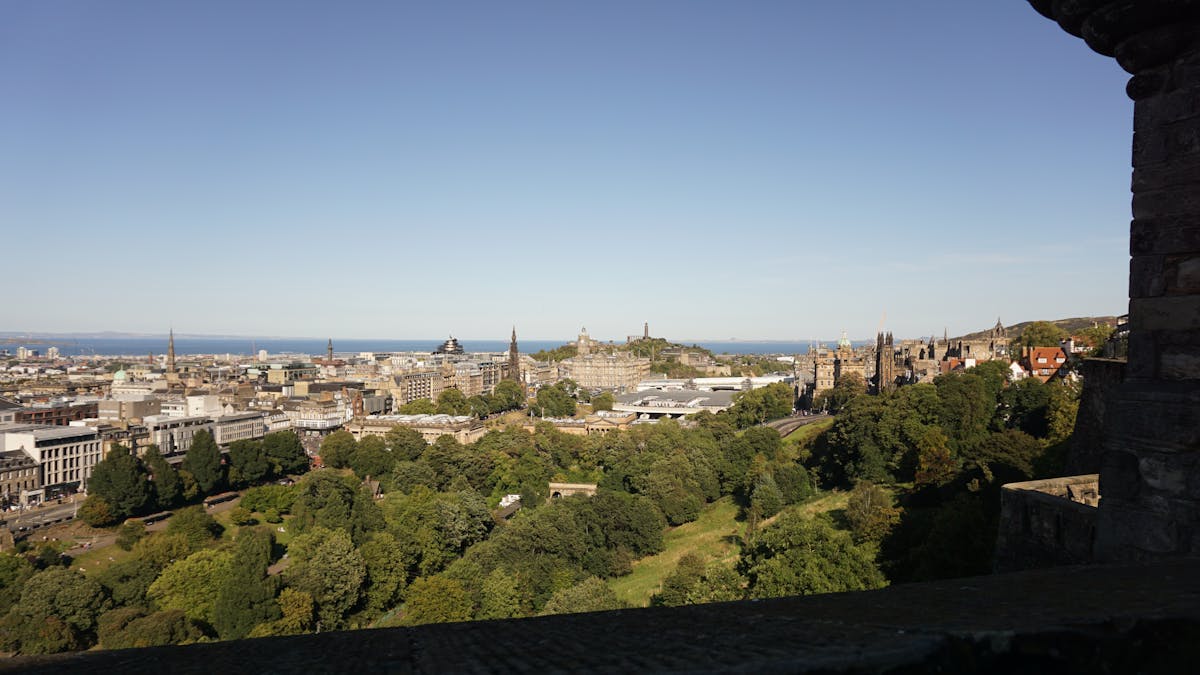 Edinburgh city skyline with the castle on the hill — departure point for Highland tours